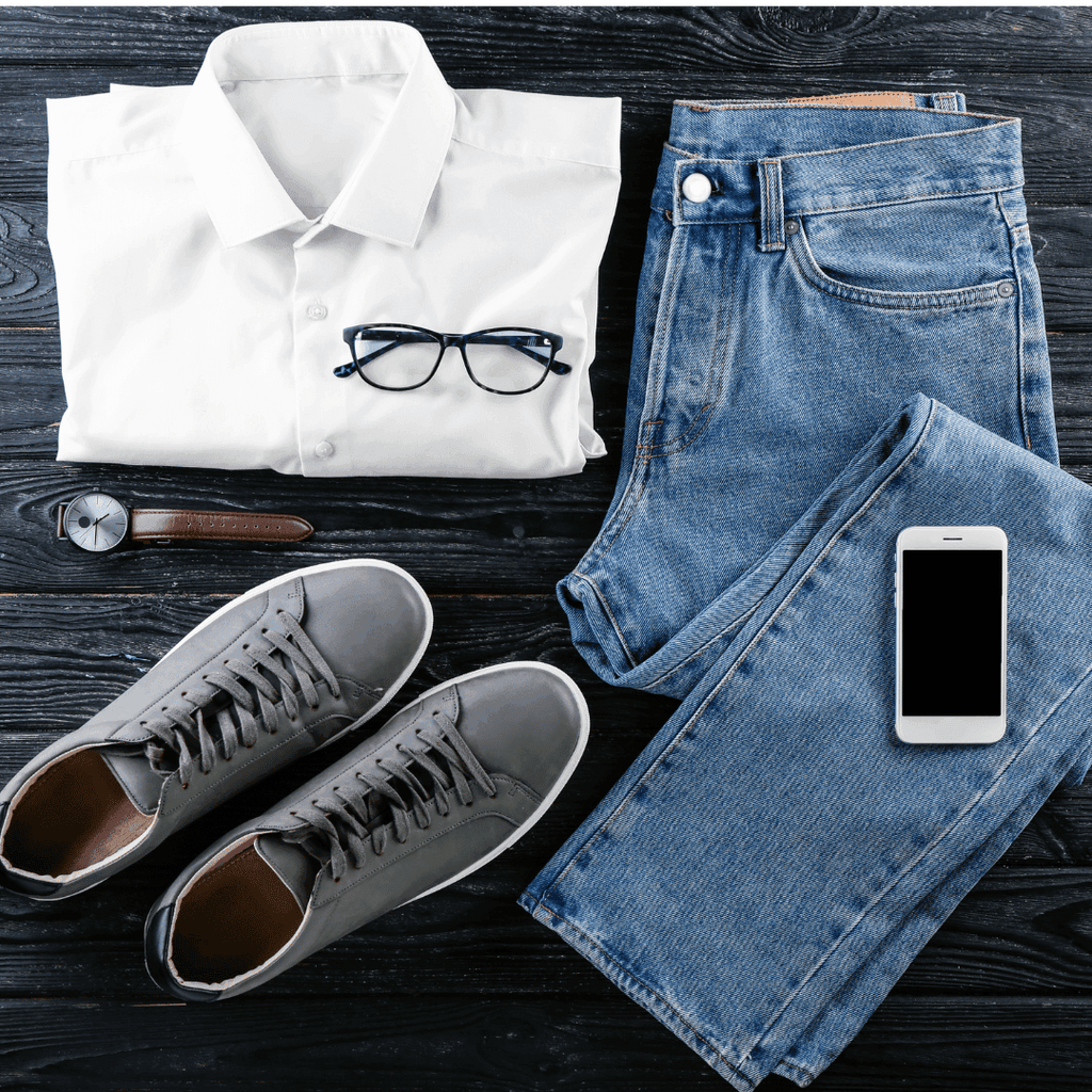 Stylish men's vacation clothing featuring lightweight shirts and relaxed pants by the poolside