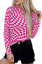 Long sleeve checkerboard shirt women in pink and white with a trendy design and relaxed fit