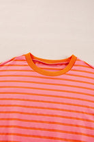 JUNIPER BLVD striped drop shoulder sweatshirt in vibrant pink and orange colors with a comfortable fit