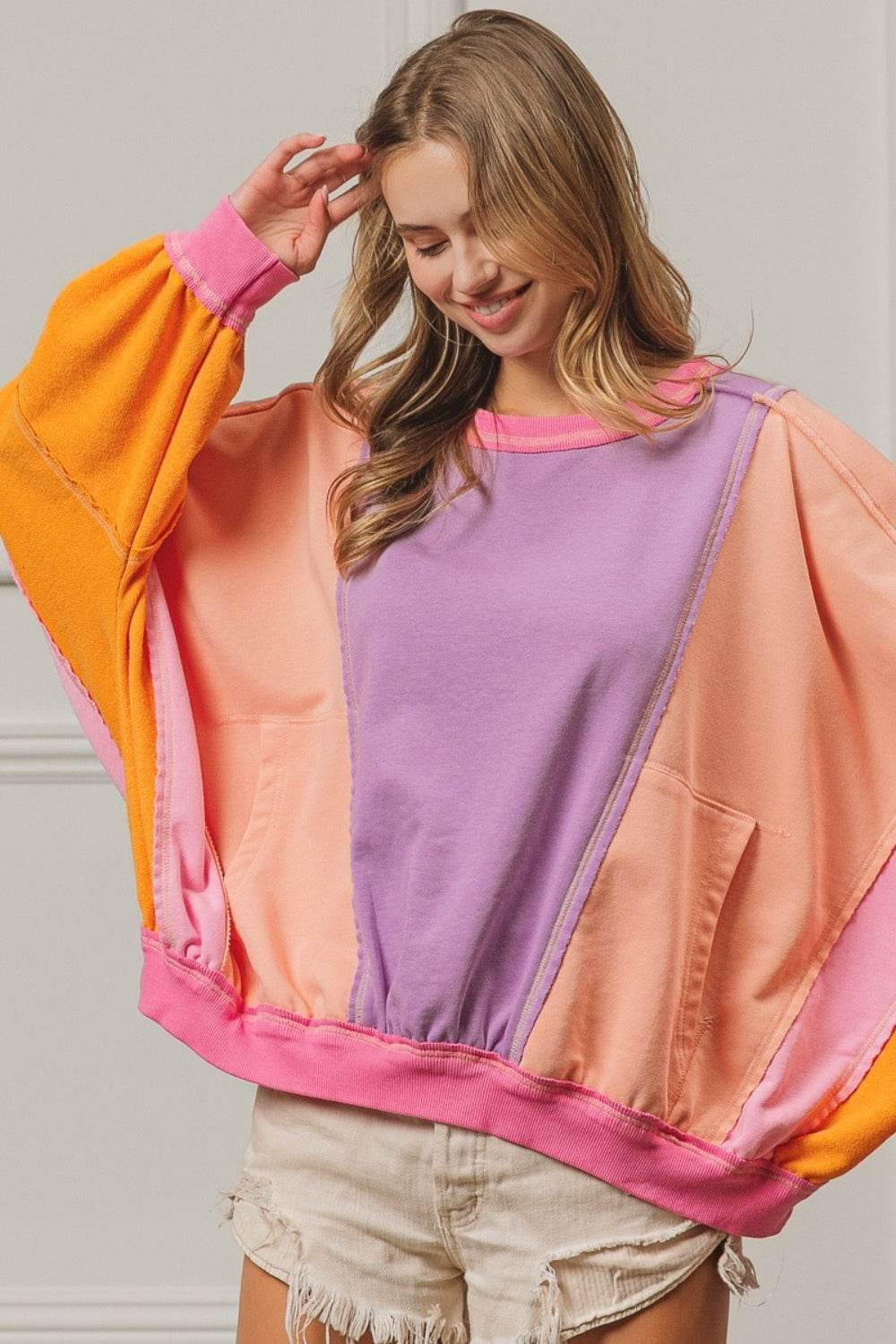 BiBi Color Block Exposed Seam Sweatshirt with Pockets - VacationGrabs