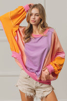 BiBi Color Block Exposed Seam Sweatshirt with Pockets - VacationGrabs