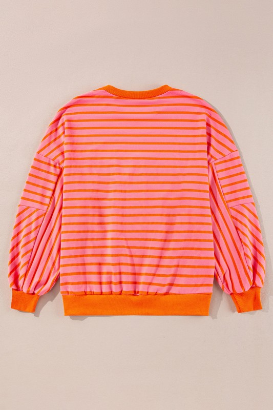 JUNIPER BLVD striped drop shoulder sweatshirt in vibrant pink and orange stripes with a relaxed fit
