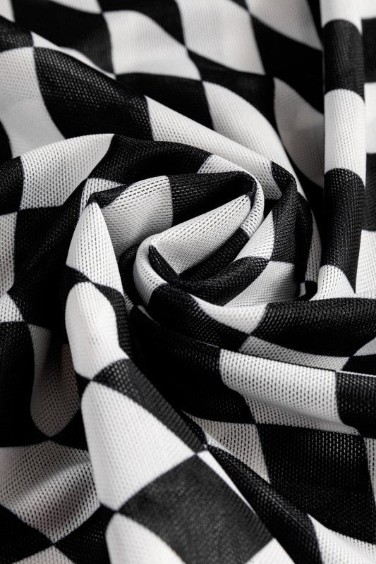 Close-up of long sleeve checkerboard shirt women fabric in black and white pattern