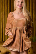 Stylish women's velvet square neck romper in brown with puff sleeves and pockets, perfect for casual outings