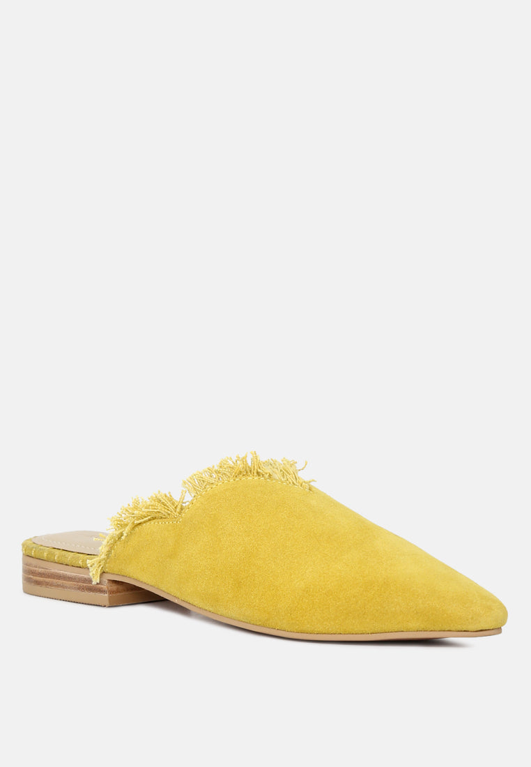 Yellow slipper with wooden sole on a white background