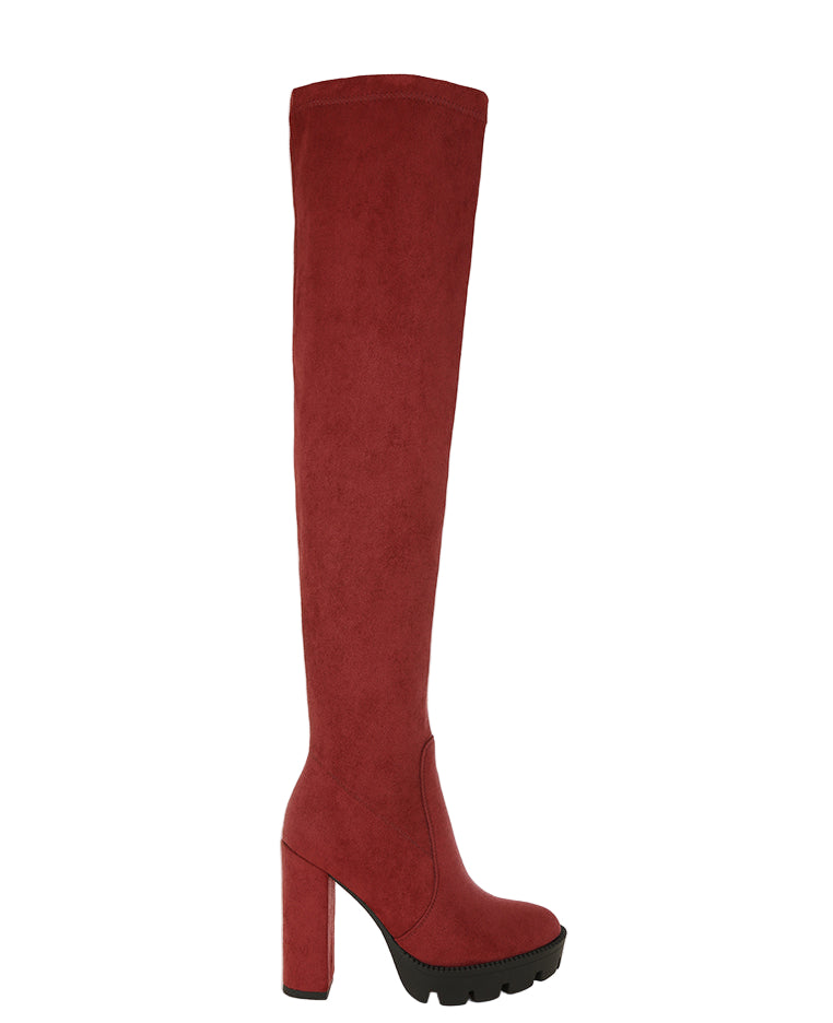 Red knee-high boot on a white background