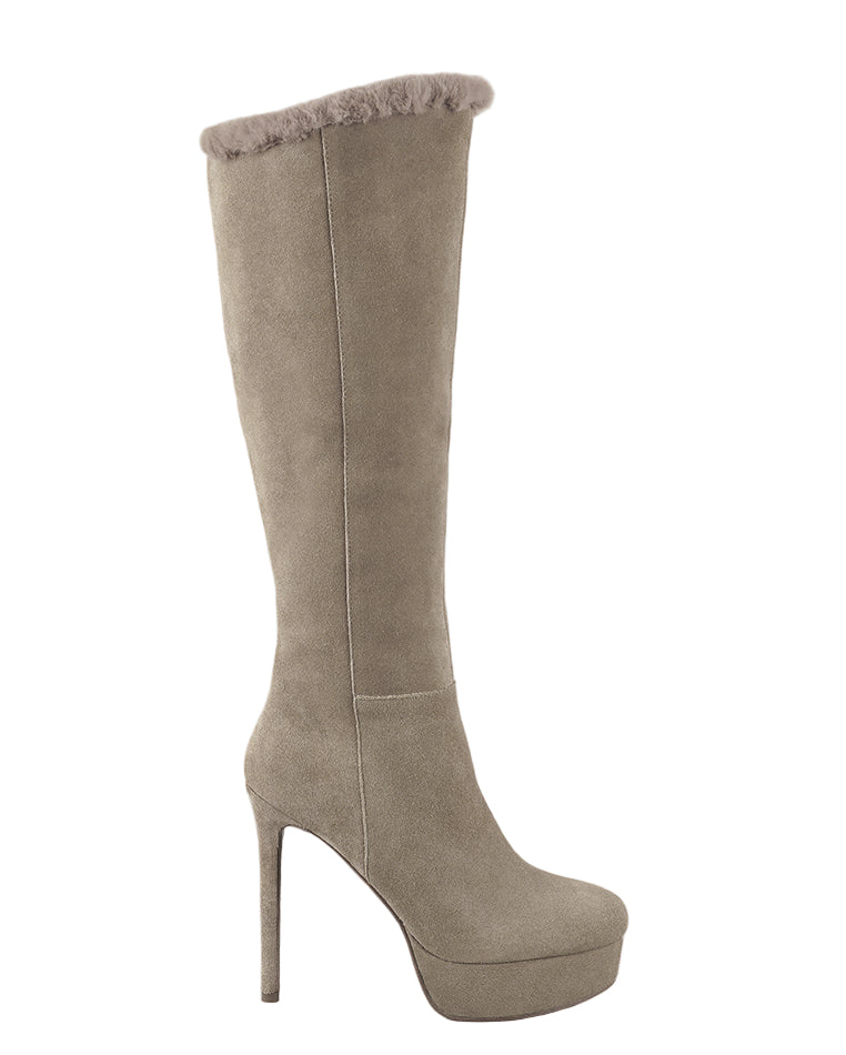 Beige knee-high boot with a high heel on a light gray background