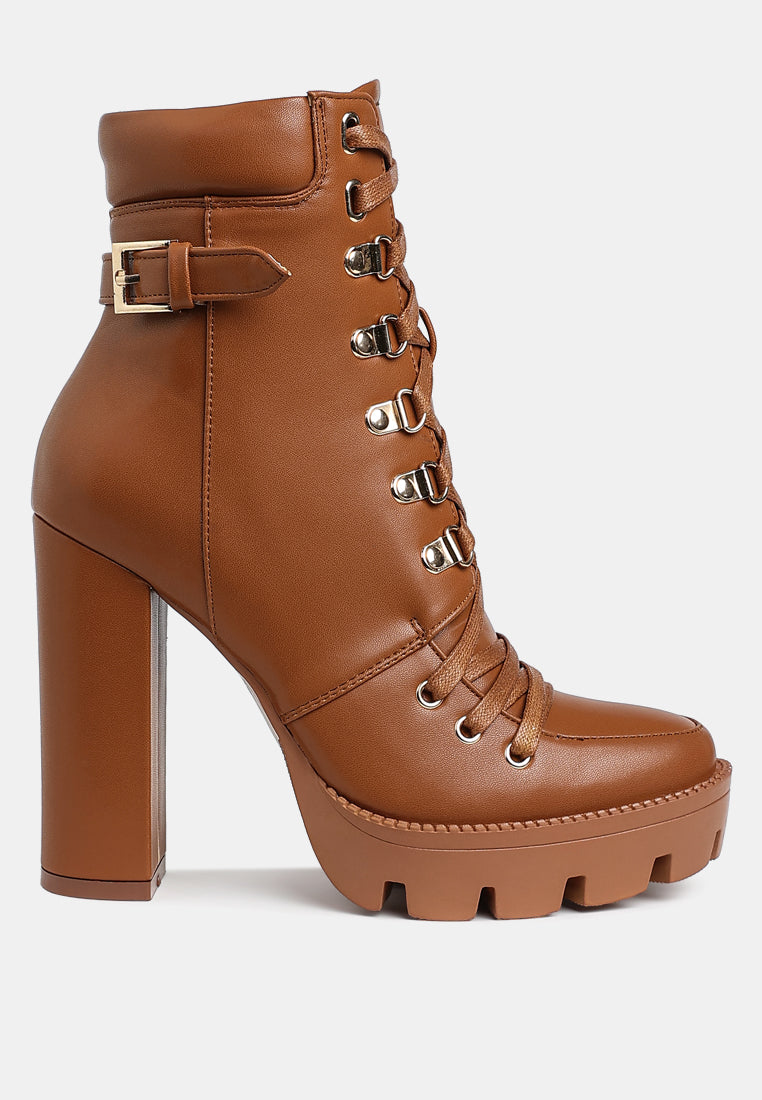 Brown platform boot with block heel on a white background