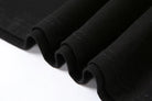 Close-up detail of black fabric stitching on an aesthetic streetwear summer top for casual style