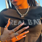 Aesthetic streetwear summer top in black with rhinestone Real Bad lettering and chunky silver chain necklace