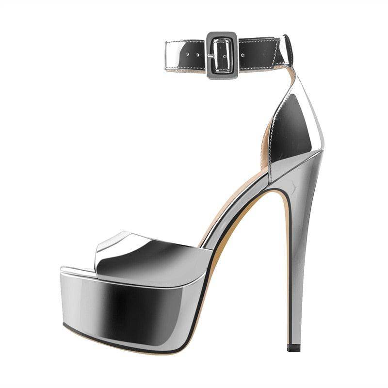 Chic silver ankle strap stilettos with a sleek design and high platform for elegant occasions