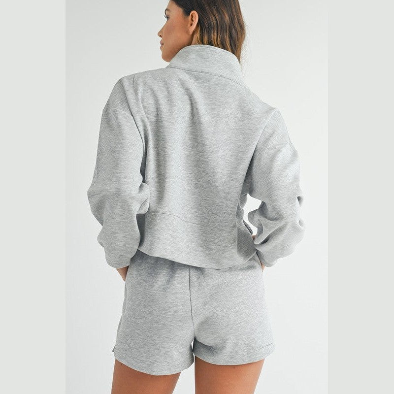 YNIQUE gray vacation athleisure wear for women featuring a long sleeve top and matching shorts set