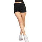 VacationGrabs women's black athletic shorts with wide waistband worn with white sneakers