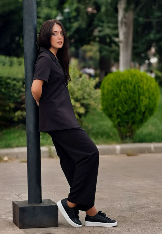 Women's embellished chunky sneakers in black for casual wear