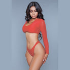 BE WICKED model wearing red long sleeve crop top and high cut bikini bottoms 1980s inspired crop swim set
