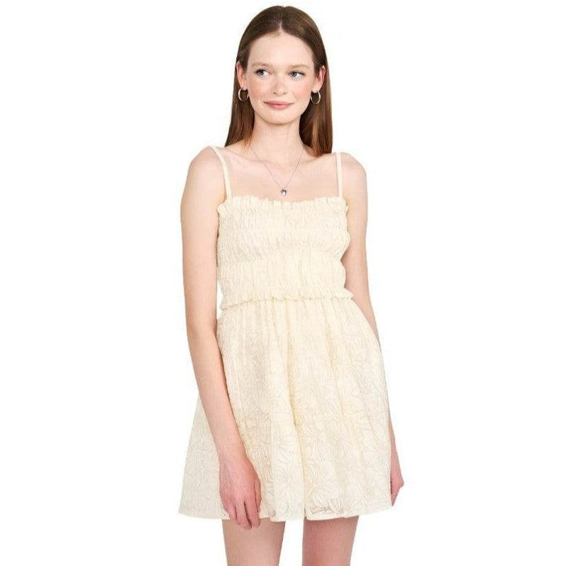 Emory Park beige spaghetti strap dress with a ruffled waistline and floral embroidery details
