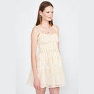 Emory Park beige spaghetti strap dress with a floral print and a fitted waist for a summery look