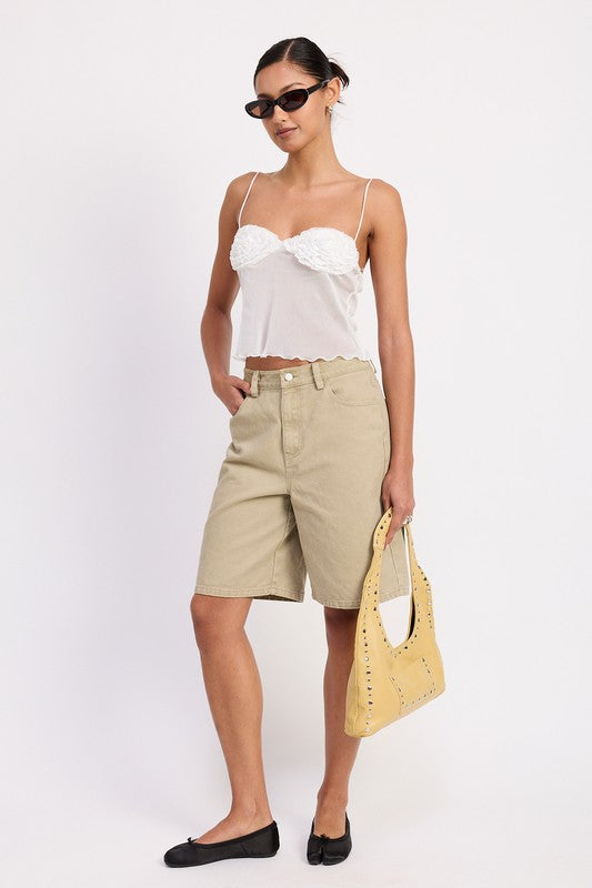 Emory Park sheer mesh floral cami top in white on model with beige bermuda shorts and yellow handbag