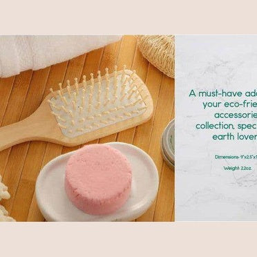 BeNat natural wooden detangling brush on a wooden surface with eco-friendly accessories