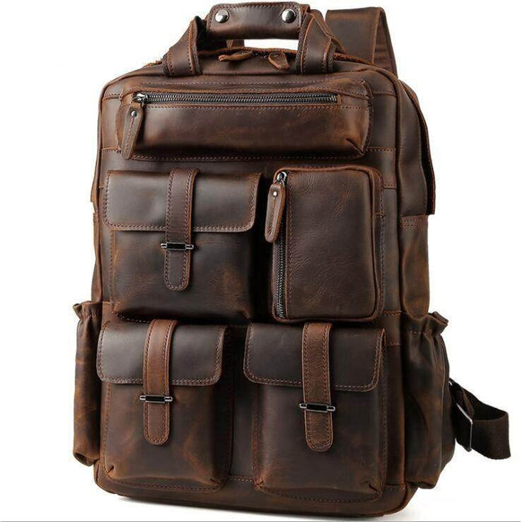 Big outdoor leather backpack with multiple pockets and sturdy design for adventures and travel