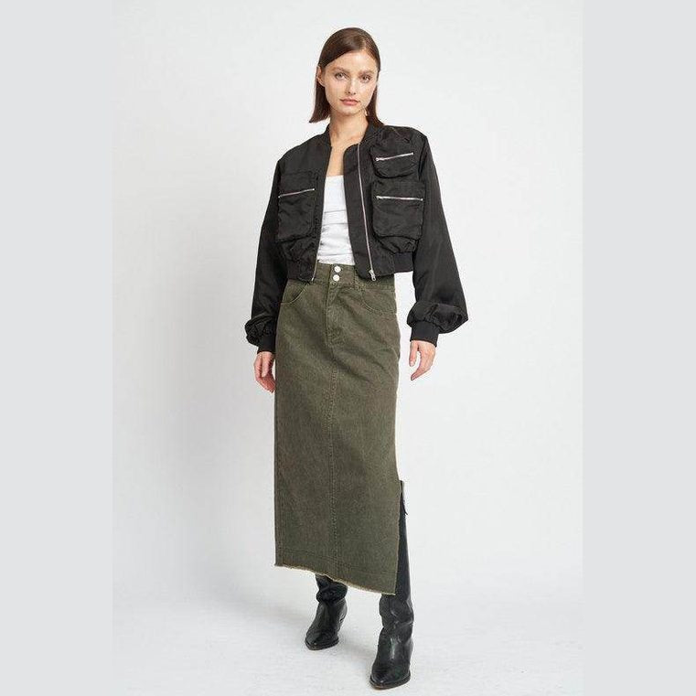 Fashionable black brown bomber jacket with oversized pockets styled with a long skirt