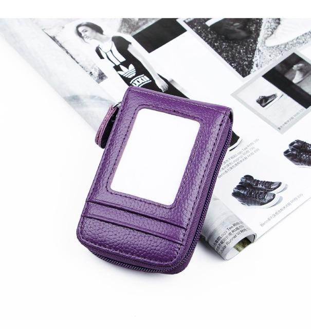Purple wallet with card slots and zipper closure, ideal accessory for daily use
