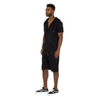 Men's black cage outfit for men featuring a zip-up hoodie and matching shorts for a stylish summer look