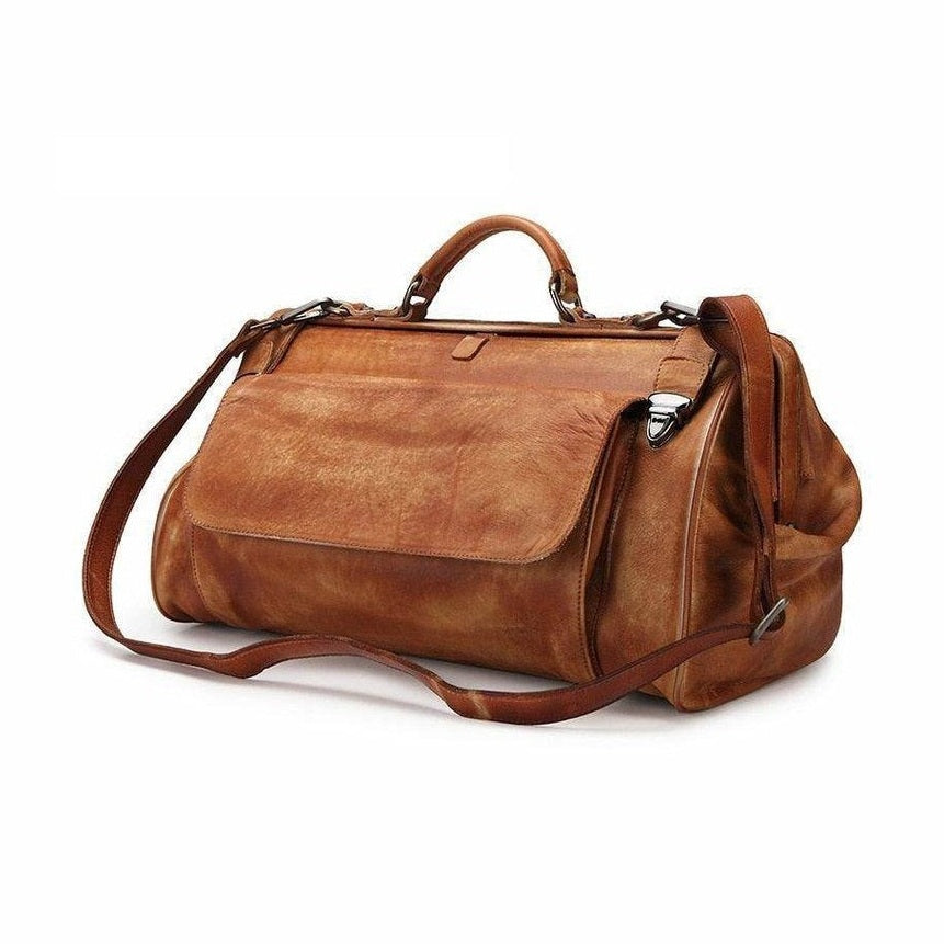 Stylish leather duffel bag in rich tan color with comfortable shoulder strap and sturdy handles