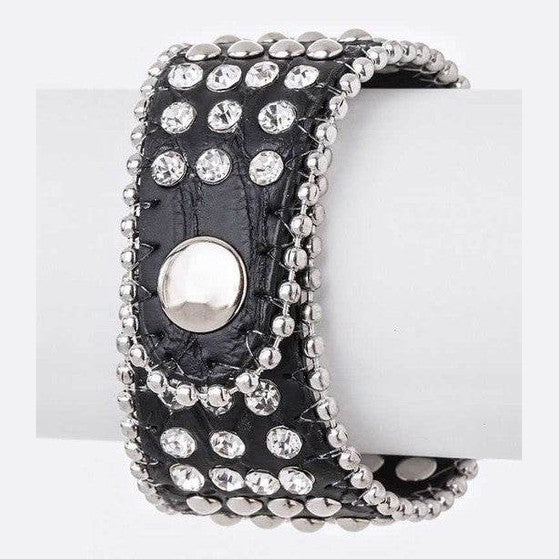 Stylish black crystal skull cuff bracelet with silver studs and a secure snap closure