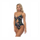 Beach Joy Bikini black floral cutout one piece swimsuit worn by woman with thin straps and front keyhole design