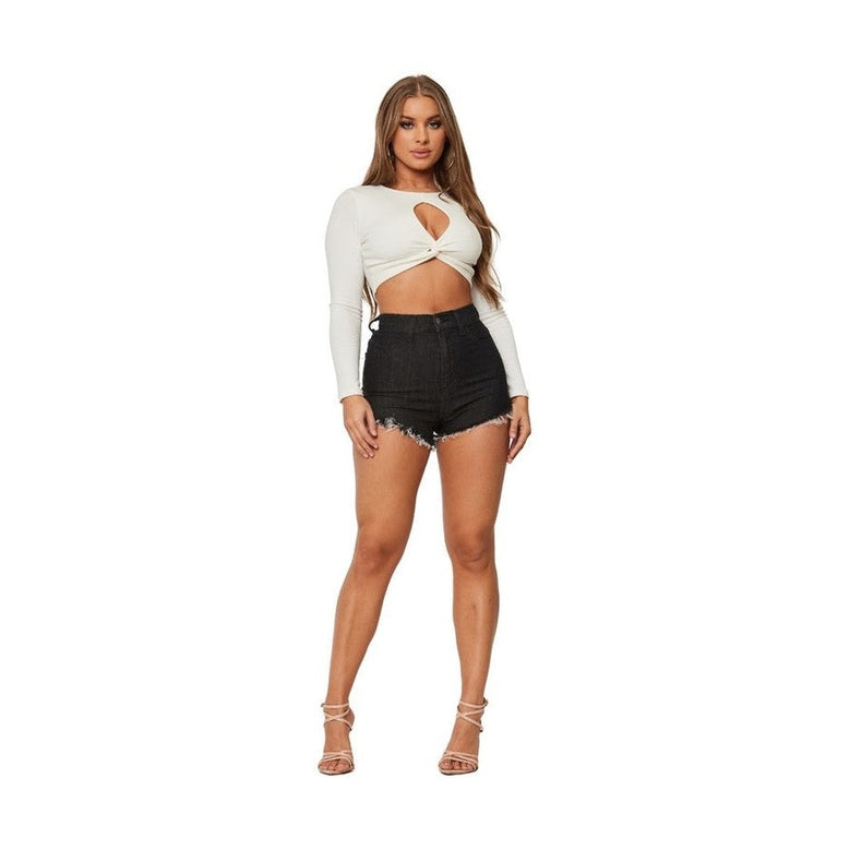 GJG Denim black high rise denim shorts with raw hem worn by woman in white crop top