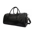 Spacious black leather weekend bag with sturdy handles and adjustable shoulder strap for travel convenience