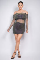 VacationGrabs black rhinestone mesh skirt worn by model with matching off shoulder top and black heels