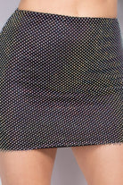 VacationGrabs black rhinestone mesh skirt with sparkling embellishments on a fitted mini design