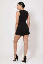 Stylish black romper for women with a fitted design and sleeveless back detailing