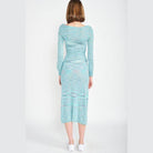 Back view of a blue scoop neck midi dress by Emory Park with long sleeves and a fitted silhouette