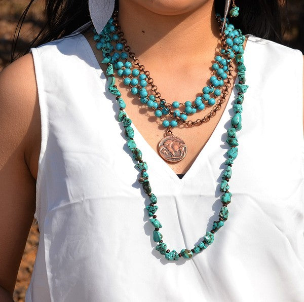 Stylish blue turquoise coin necklace layered with matching beaded strands for a trendy look