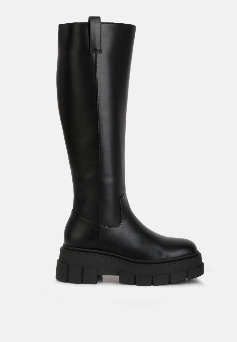 Black knee-high boot on a white background