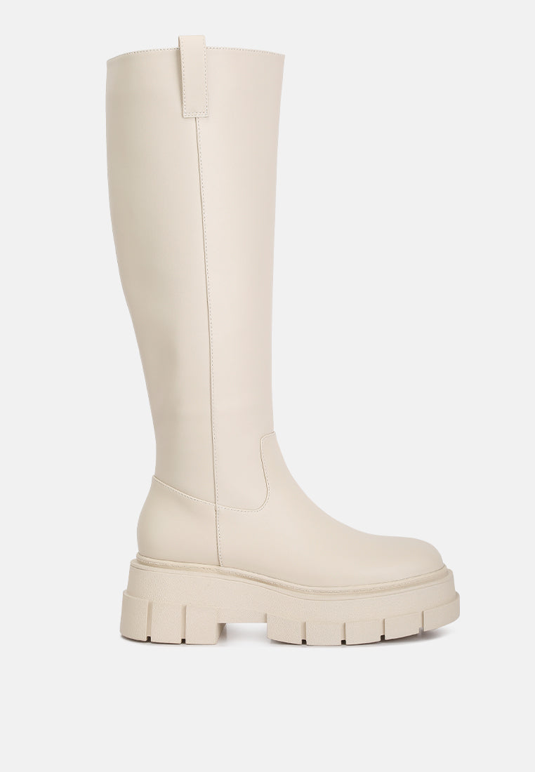 Beige knee-high boot on a white background