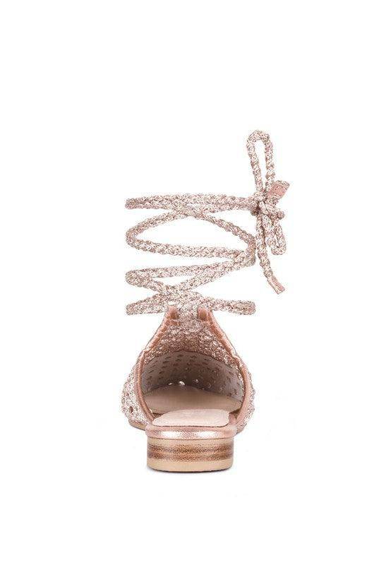 Rag Company boho style mule flats in rose gold with intricate lace-up design and comfortable fit