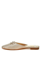 Rag Company bow accent flat mules in metallic gold with a textured finish and low heel women's shoes