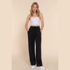VacationGrabs lightweight travel pants for women in black with drawstring waist and relaxed fit