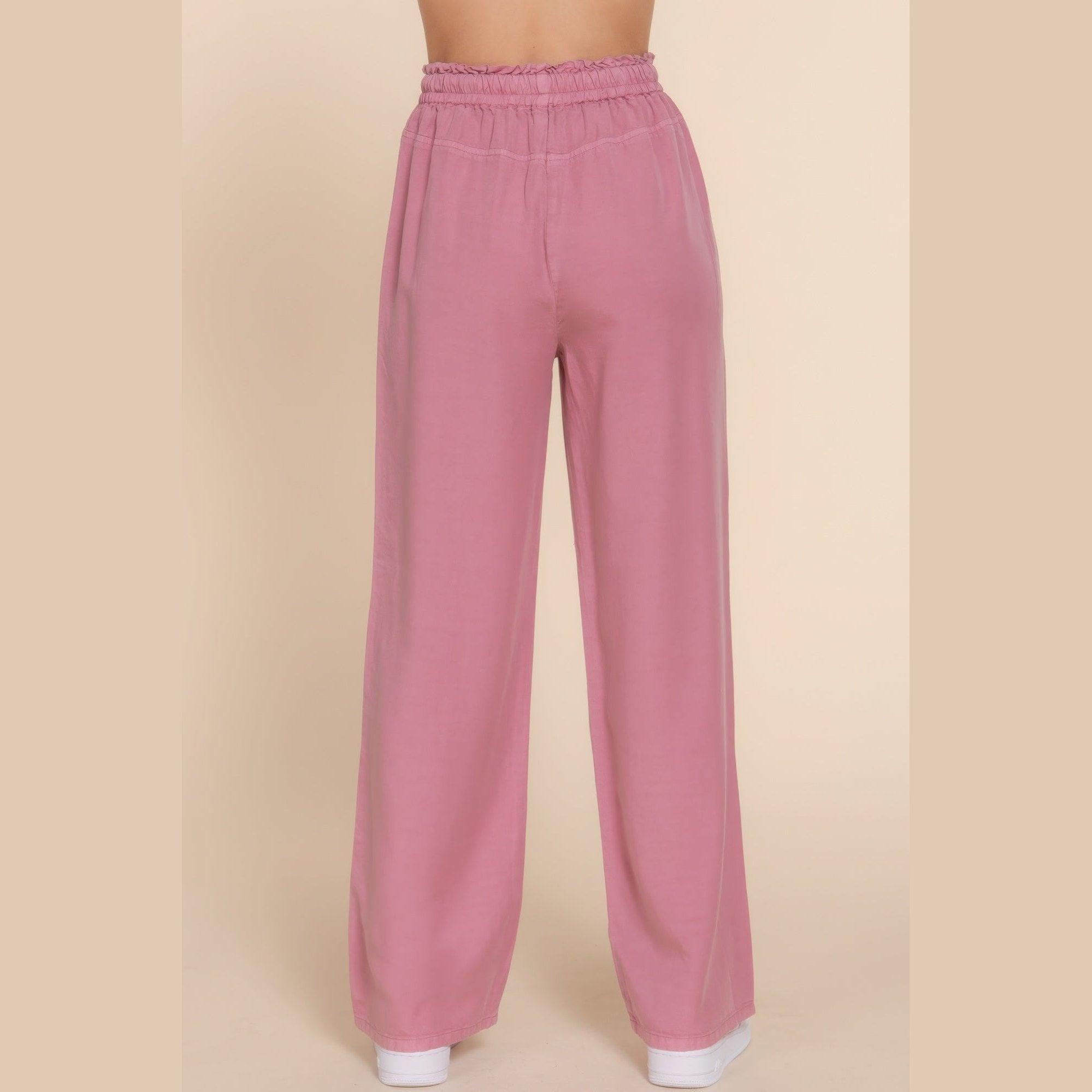 VacationGrabs lightweight travel pants for women in soft pink with elastic waistband and wide legs