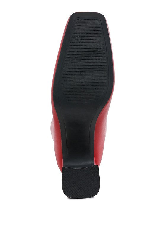 Sole view of Rag Company brown vegan leather ankle boots with textured grip for stability