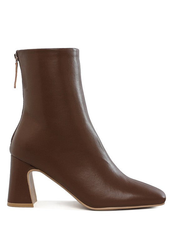 Brown vegan leather ankle boots with a modern block heel for stylish comfort