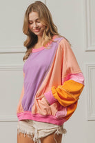 BiBi Color Block Exposed Seam Sweatshirt with Pockets - VacationGrabs