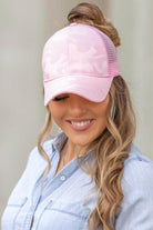 Aili's Corner camouflage messy bun cap in pink, designed for casual comfort and style