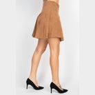 VacationGrabs casual A-line corduroy skirt in brown worn with black high heels