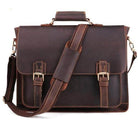 Stylish brown leather briefcase with adjustable strap, perfect for a casual blue messenger bag look
