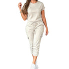 VacationGrabs casual crew neck short sleeve jumpsuit in beige with drawstring waist and stylish design
